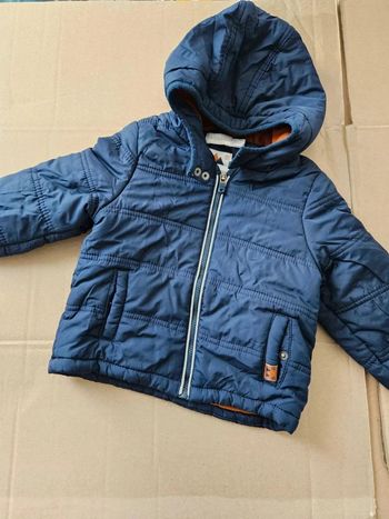 Doudoune bleue marine 23 mois + une camel gratuite