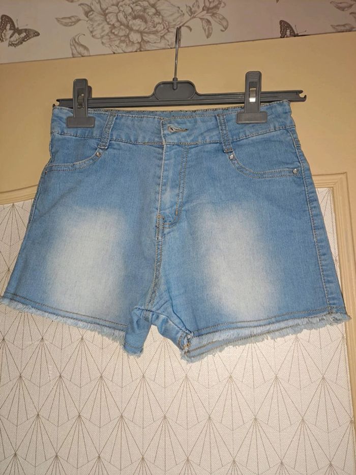 T-shirt fille bleu clair délavé tbe 14 ans - photo numéro 3