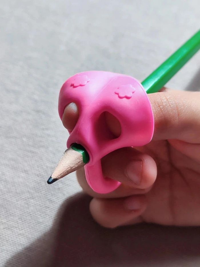 Correcteur de posture d'écriture en silicone souple - photo numéro 2
