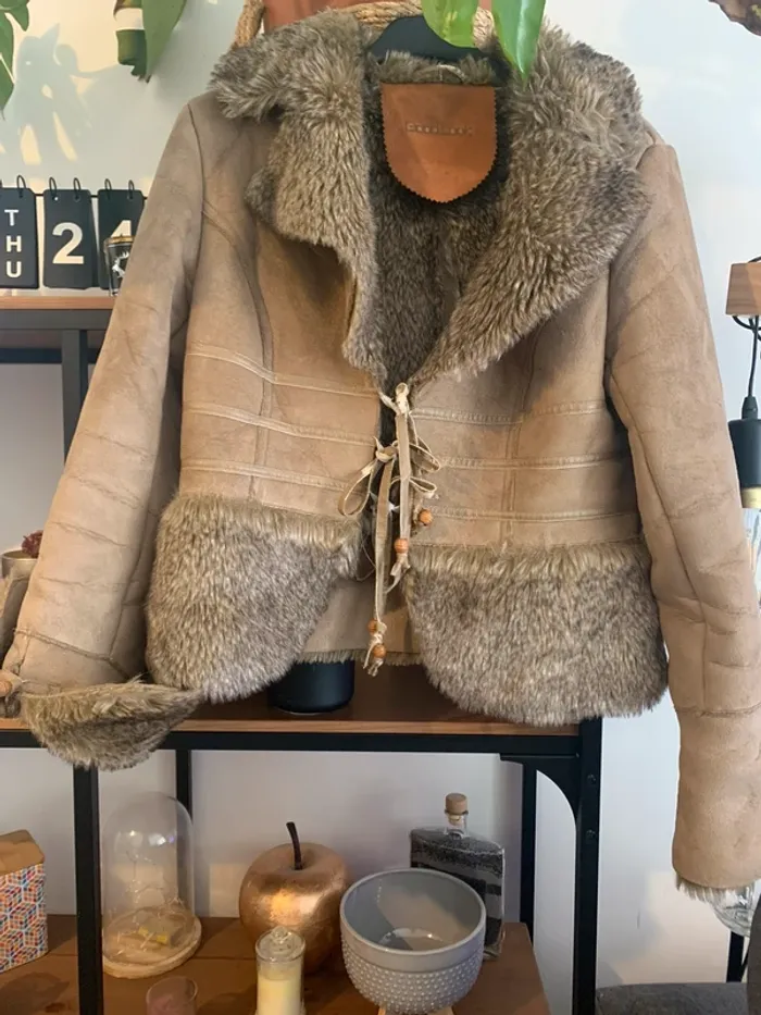 Manteau fausse fourrure