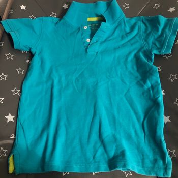 Polo primark bleu 122 cms 6-7 ans