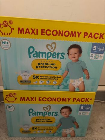 cartons couches Pampers premium taille 5 neuf 