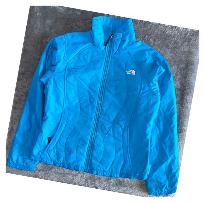 Veste doudoune tye north face Femme taille M Bleu clair