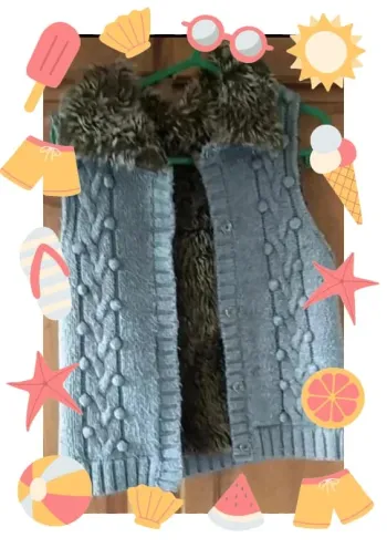 Gilet en tricot sans manches avec fausse fourrure