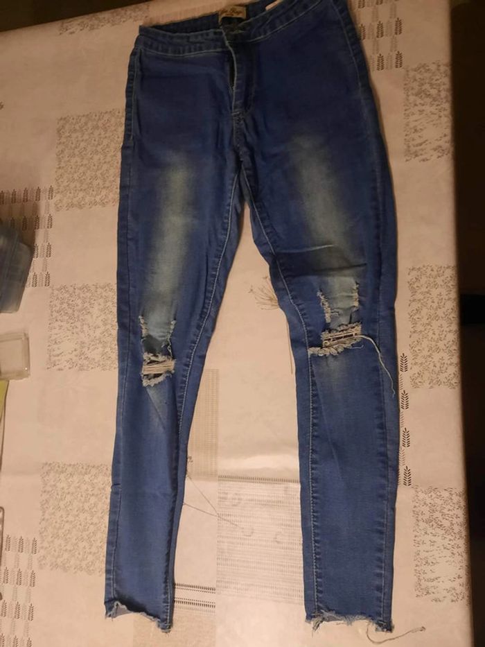 Pantalon en jeans à trous