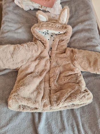 Manteau fausse fourrure