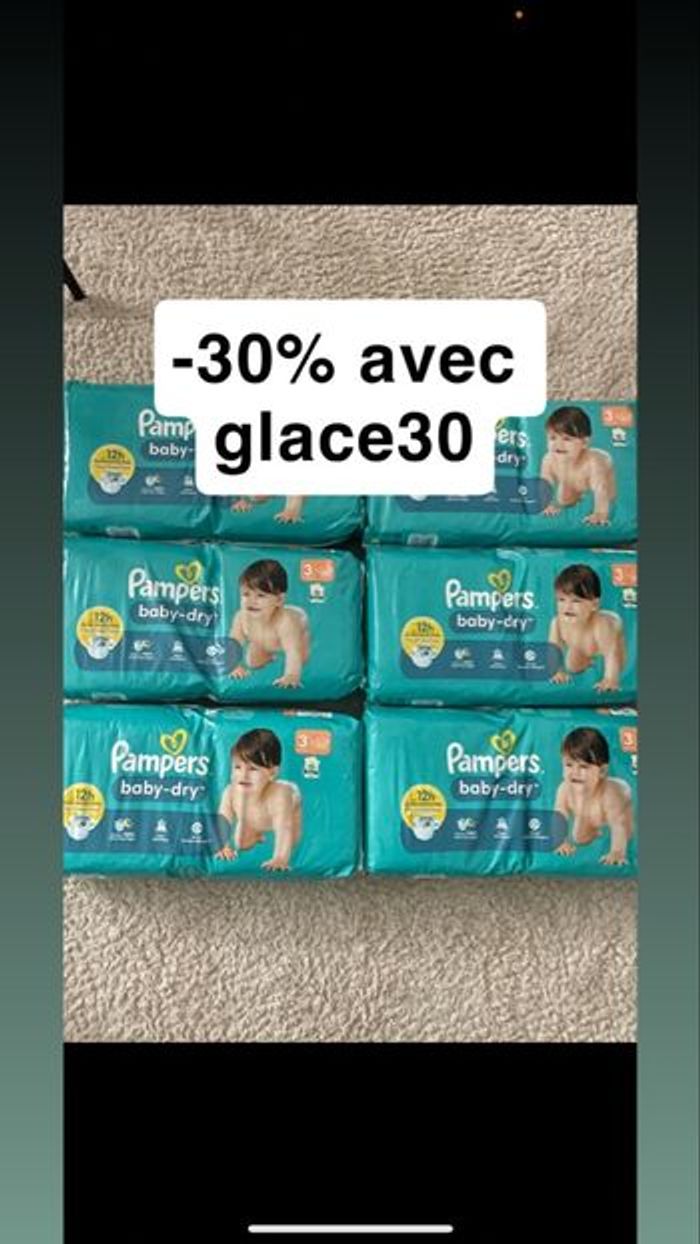 Six paquets de couches Pampers taille 4+