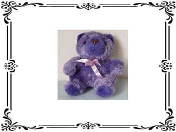 Peluche ourson mauve.