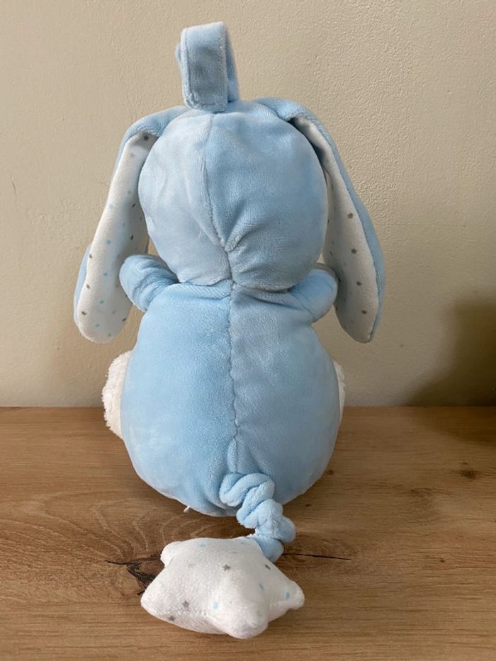Doudou peluche ours déguisé en lapin bleu blanc étoiles musical max et sax - photo numéro 3
