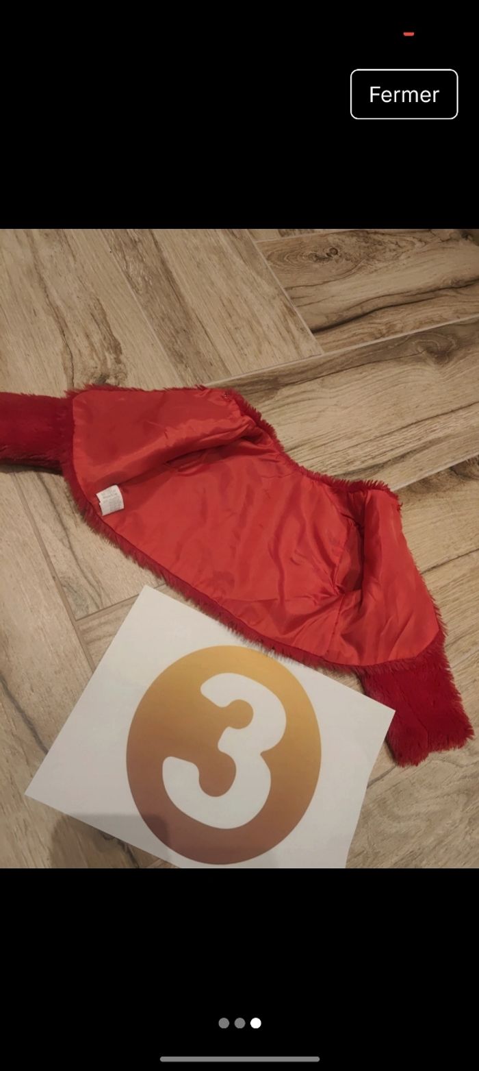 Veste fourrure 
Coloris rouge 
Taille 3-6 mois 62 cm - photo numéro 3