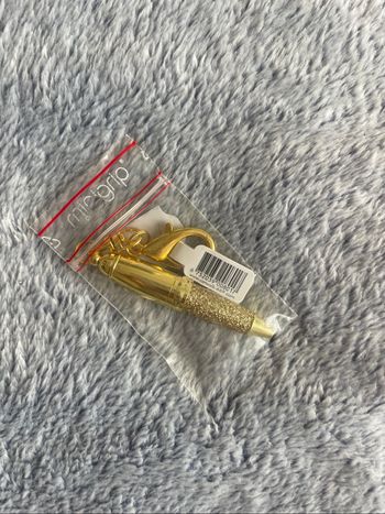 Porte clef miniature stylo doré catwalk