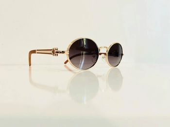 Lunette de soleil ovale mixte Polarisée dorée et marron verres dégradés