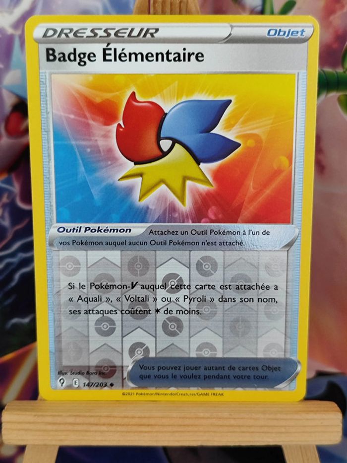 Badge élémentaire reverse 147/203 évolution céleste