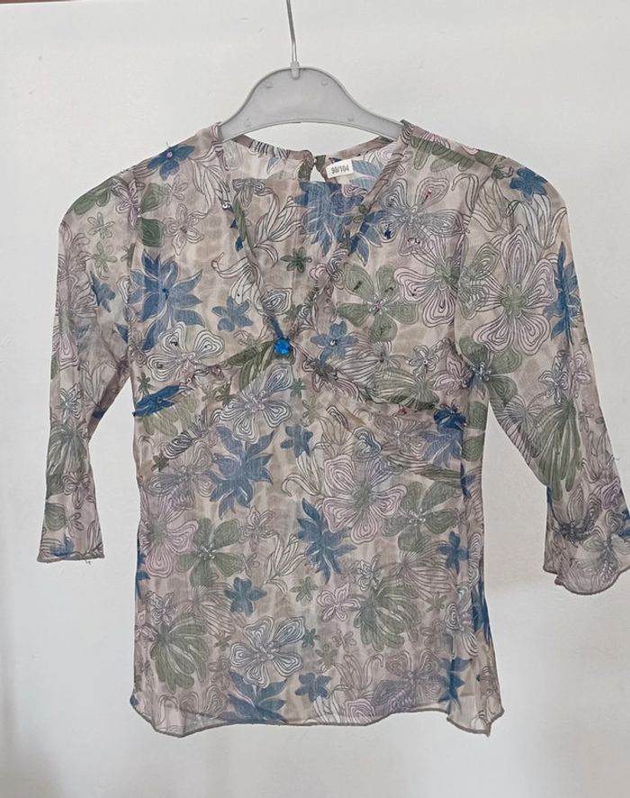 Haut fleuri transparent 3 ans.