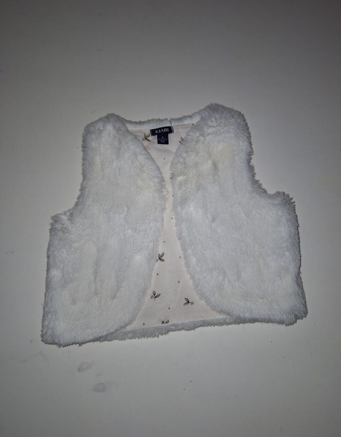 Gilet sans manche fausse fourrure