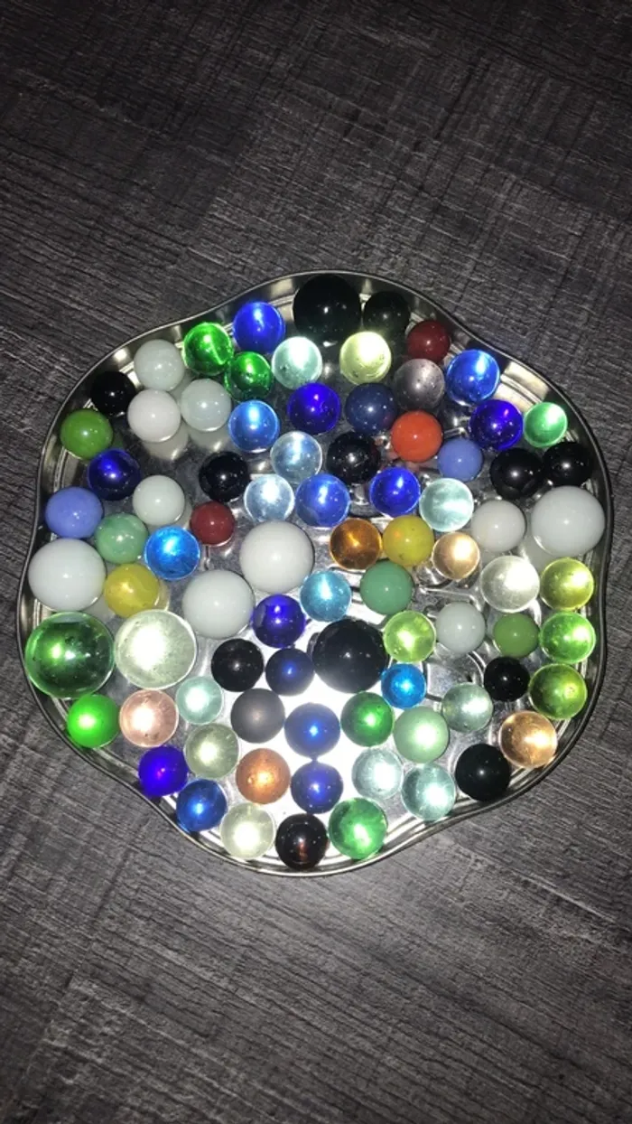 Énorme lot de 25 billes unies nacré