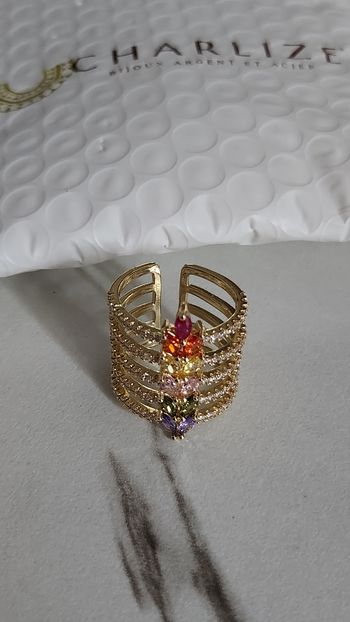 Bague acier inoxydable plaqué or jaune et zircons 