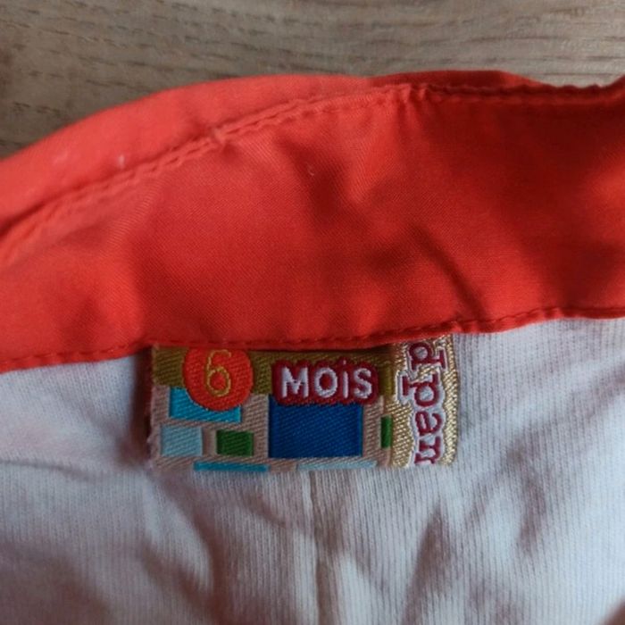 combinaison orange sans manches dpam
un haut côtelé blanc in extenso
gilet pull à boutons - photo numéro 3