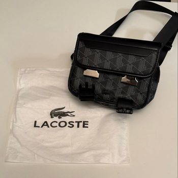 sacoche lacoste Noir neuf presque jamais porté