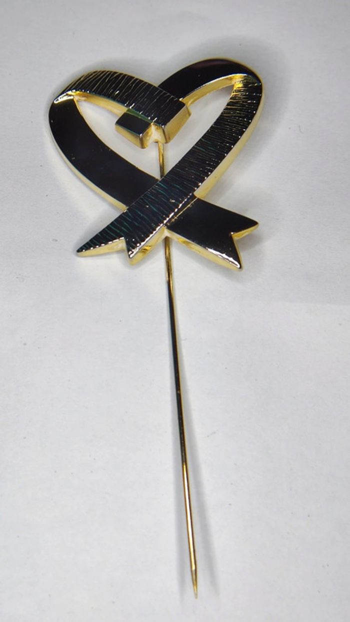 Broche ou épingle à chapeau