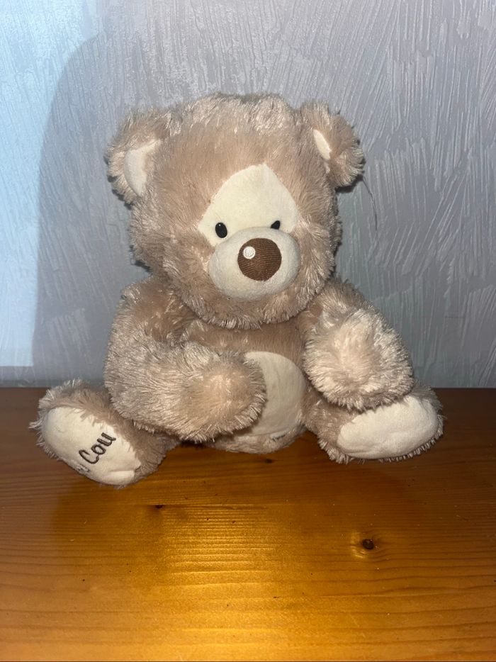 Peluche qui parle coucou