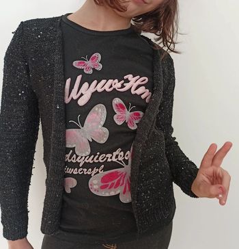 Gilet noir fêtes 7/8 ans