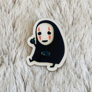 Broche No Face