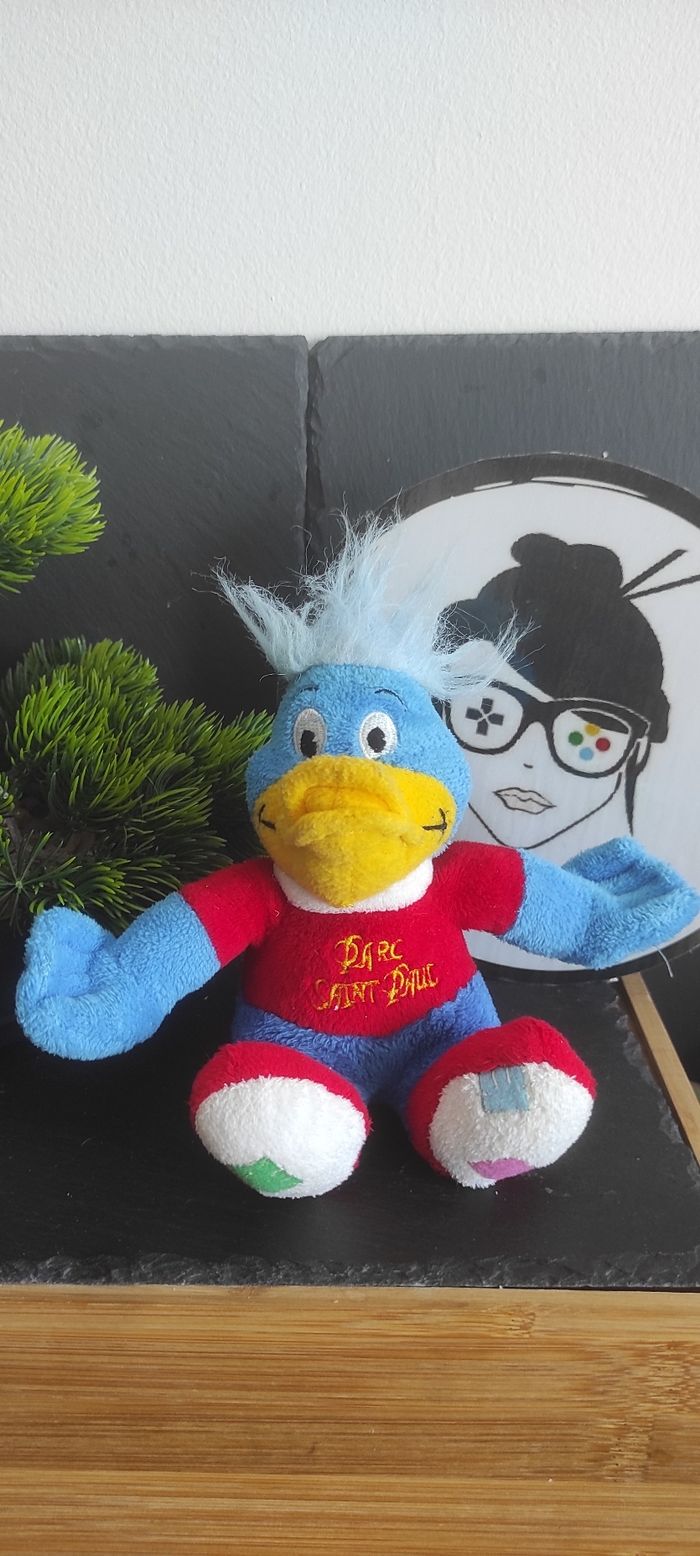 peluche parc saint paul oiseau bleu rouge jaune canard blanc Doudou Attraction