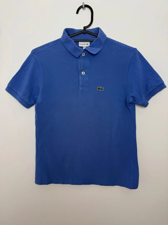 Polo Lacoste garçon 12 ans bleu parfait état