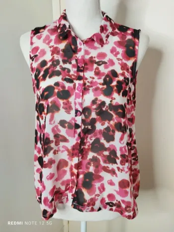 Blouse sans manche taille 42