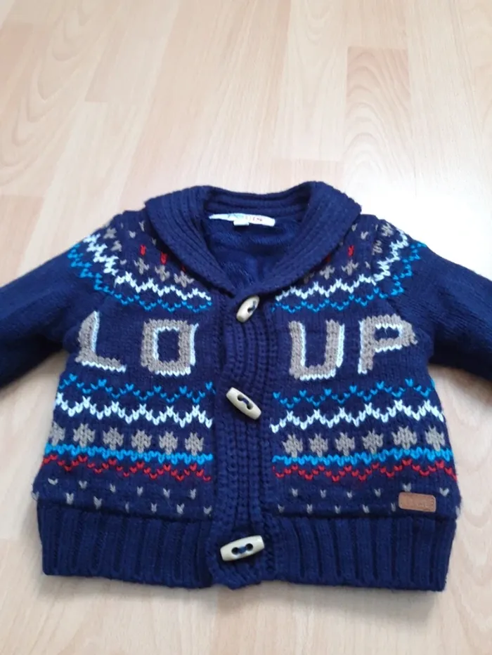 Très jolie veste en maille doublée polaire