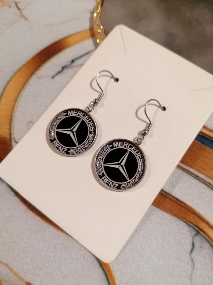 Boucle d'oreille mercedes Benz