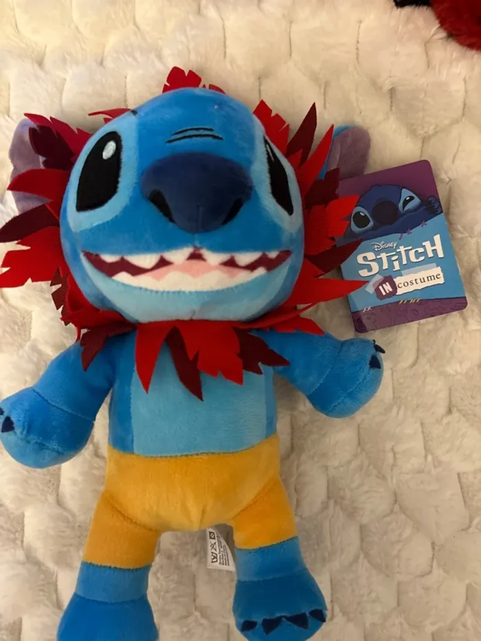 Peluche stitch roi lion