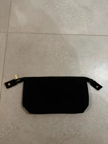 Pochette noire, très bon état, 29x16cm