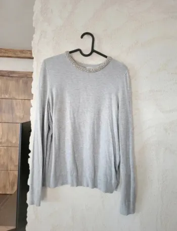 Pull avec collier