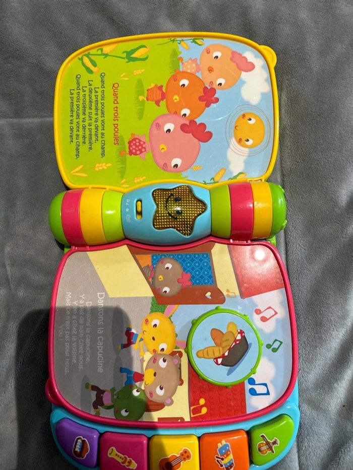 Livre d’éveil sonore do re mi super livre enchanté - photo numéro 4