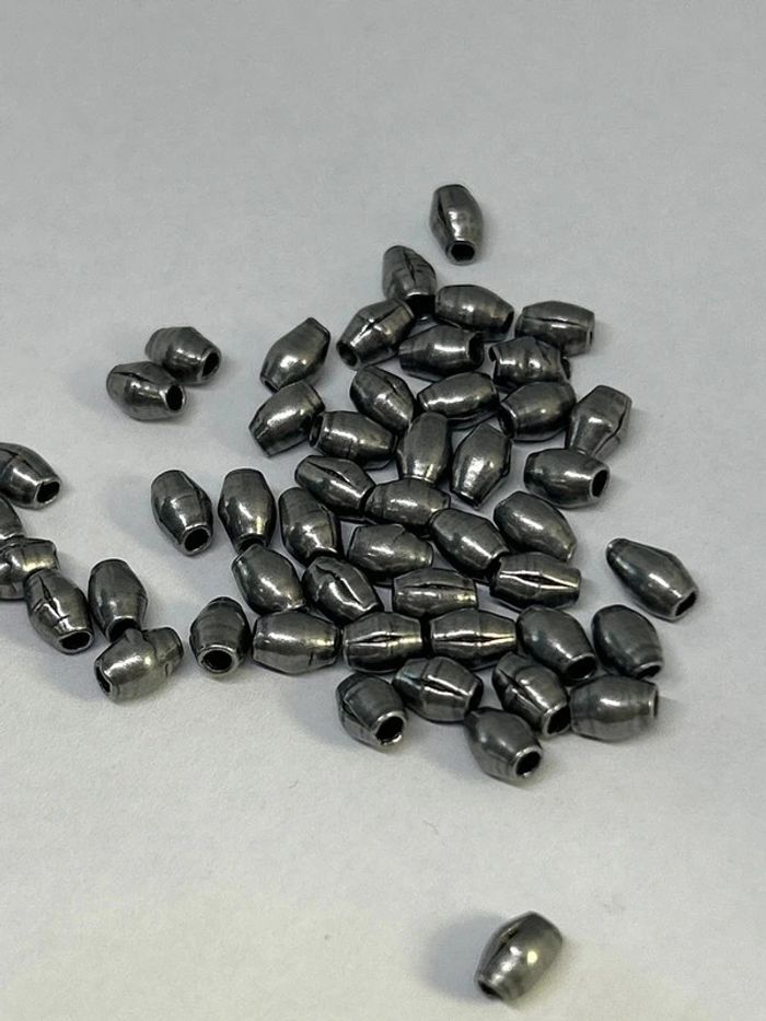 C423. Lot de 50 perles en alu des années 50