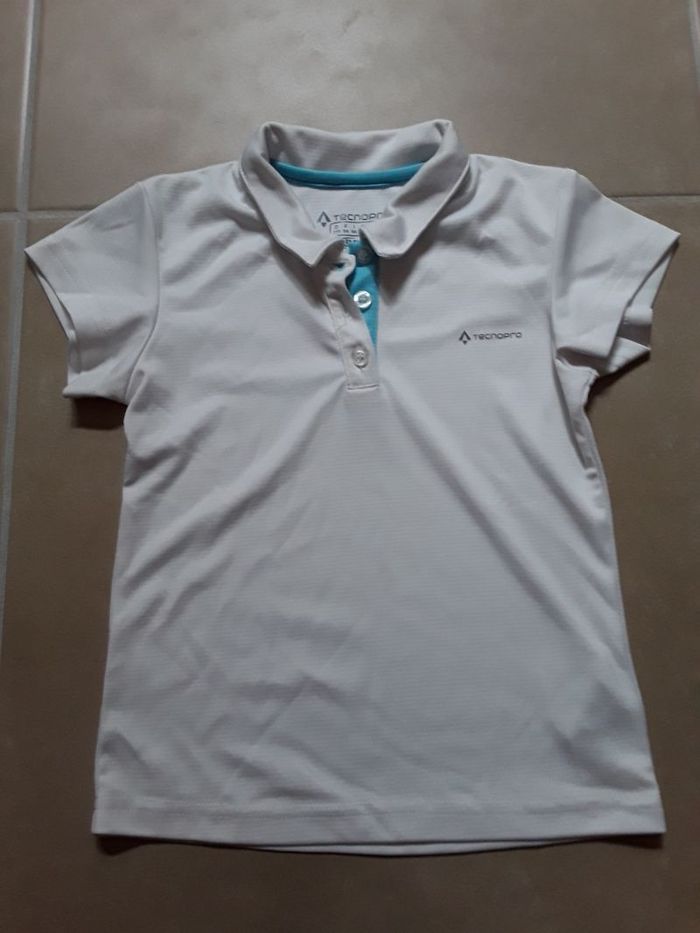 Polo de tennis MC blanc fille 6 ans TECNOPRO TBE
