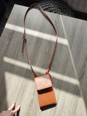 Besace porte téléphone