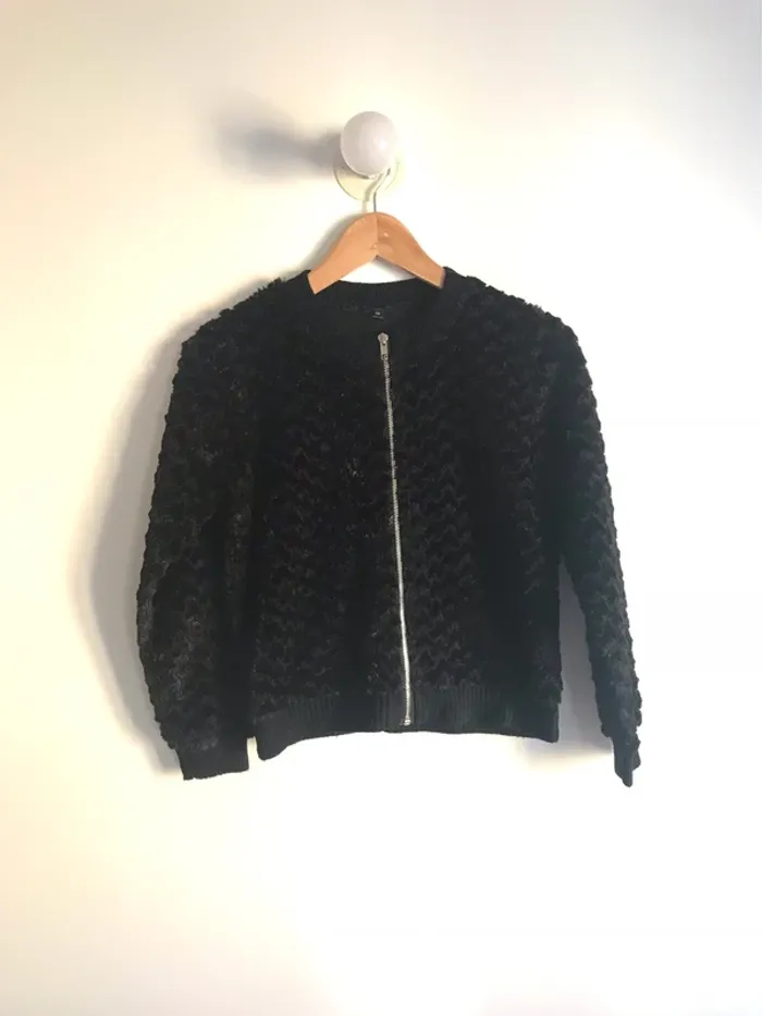 Veste en fausse fourrure noire et brillante 12 ans
