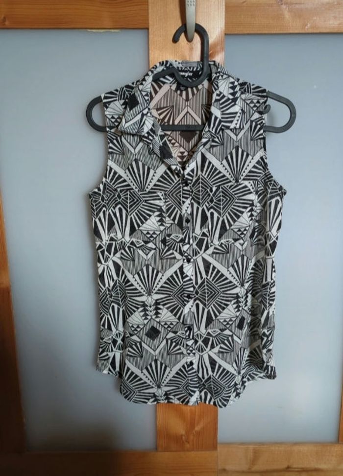 Chemise sans manches transparente