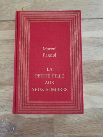 Livre La petite fille aux yeux sombres de Marcel Pagnol édition 1984