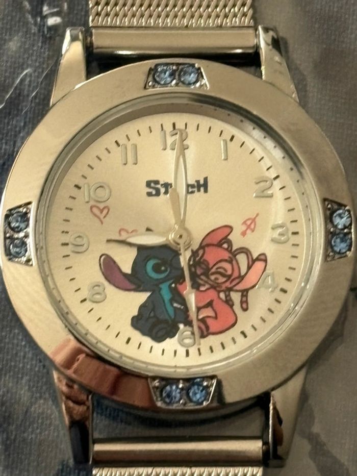 Montre Stitch neuve argenté