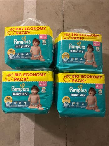 4 paquets couches t4 Pampers