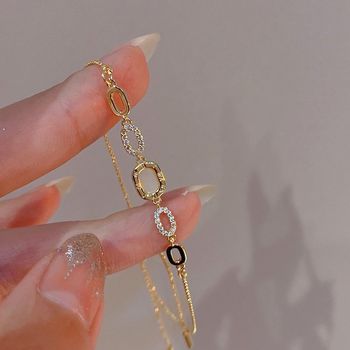 Rare bracelet en zircone plaqué or 18 carats 