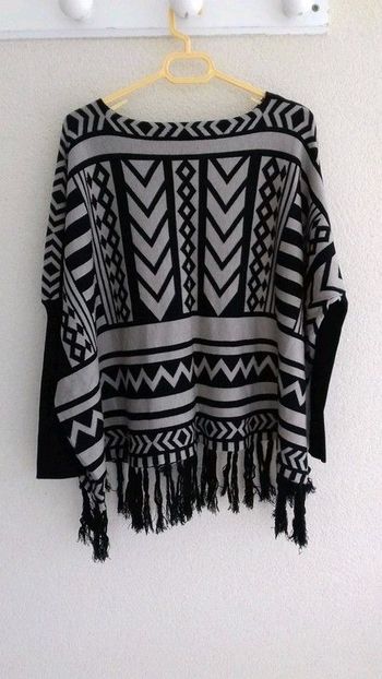 Pull style poncho à franges