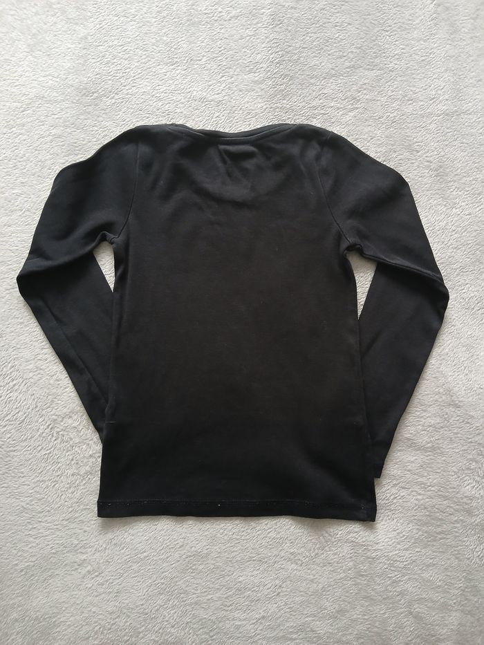 T shirt noir
Taille 10 ans 
manches longues - photo numéro 2