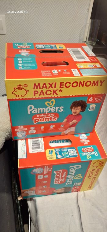 Lot de deux cartons couches pampers pants taille 6