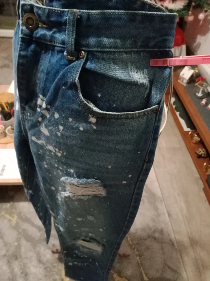 Jeans bleu troué - photo numéro 7
