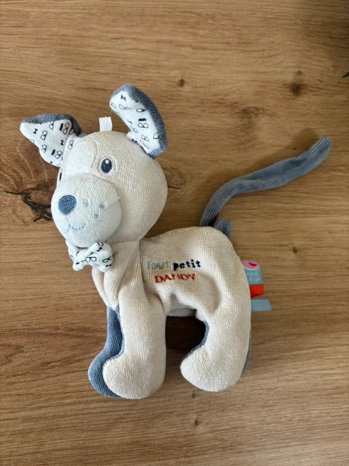 Doudou chien tout petit dandy attache sucette sucre d’orge